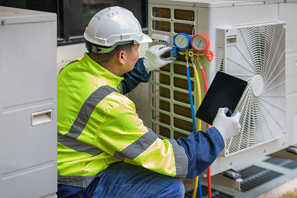 Professional Hvac technician working in Camden, AL